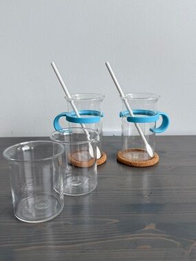 2 x vintage BODUM mugs  with cork coasters, plastic spoons & cream & sugar conta
